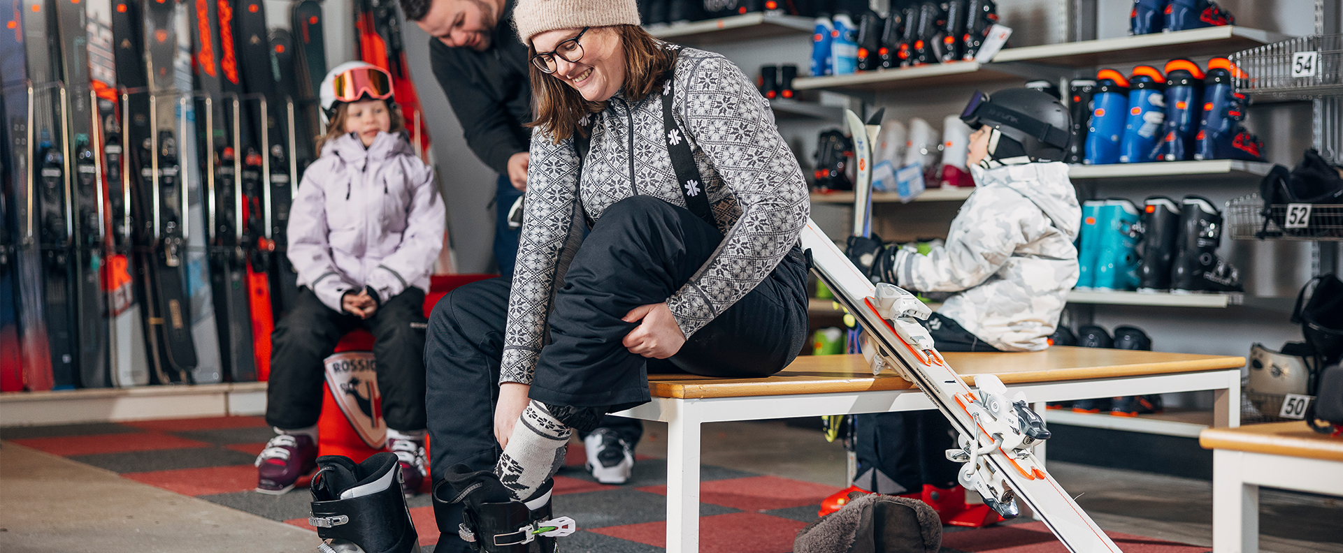 Woman trying on boots